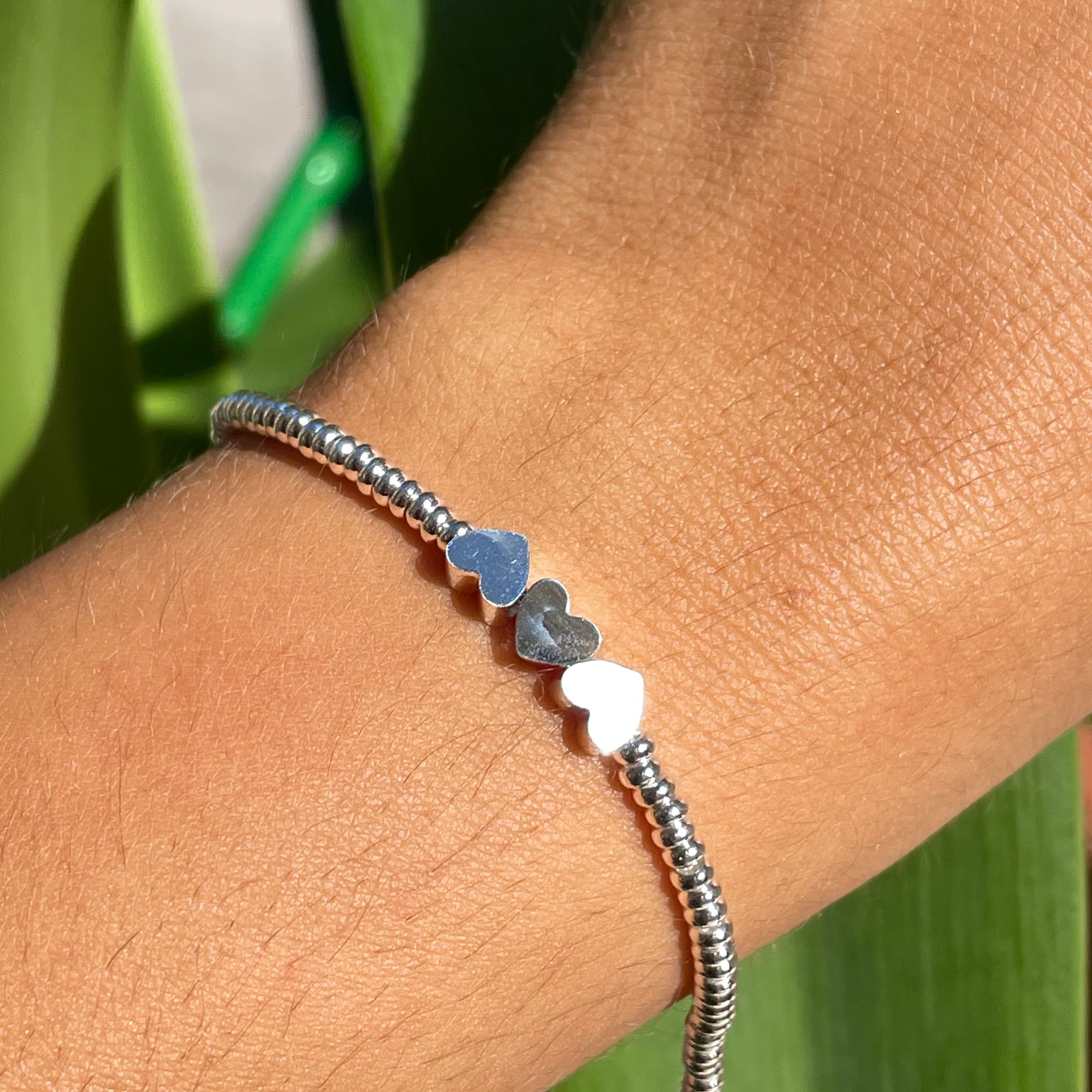 Bracciale tre cuori in 2 colori