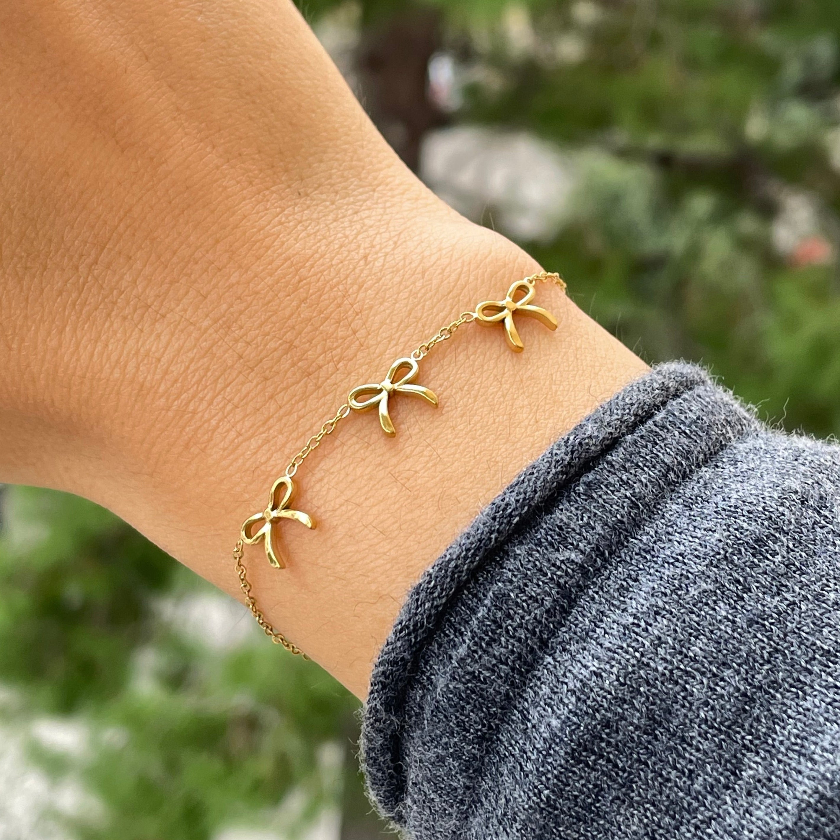 Bracciale tre fiocchetti in 2 colori