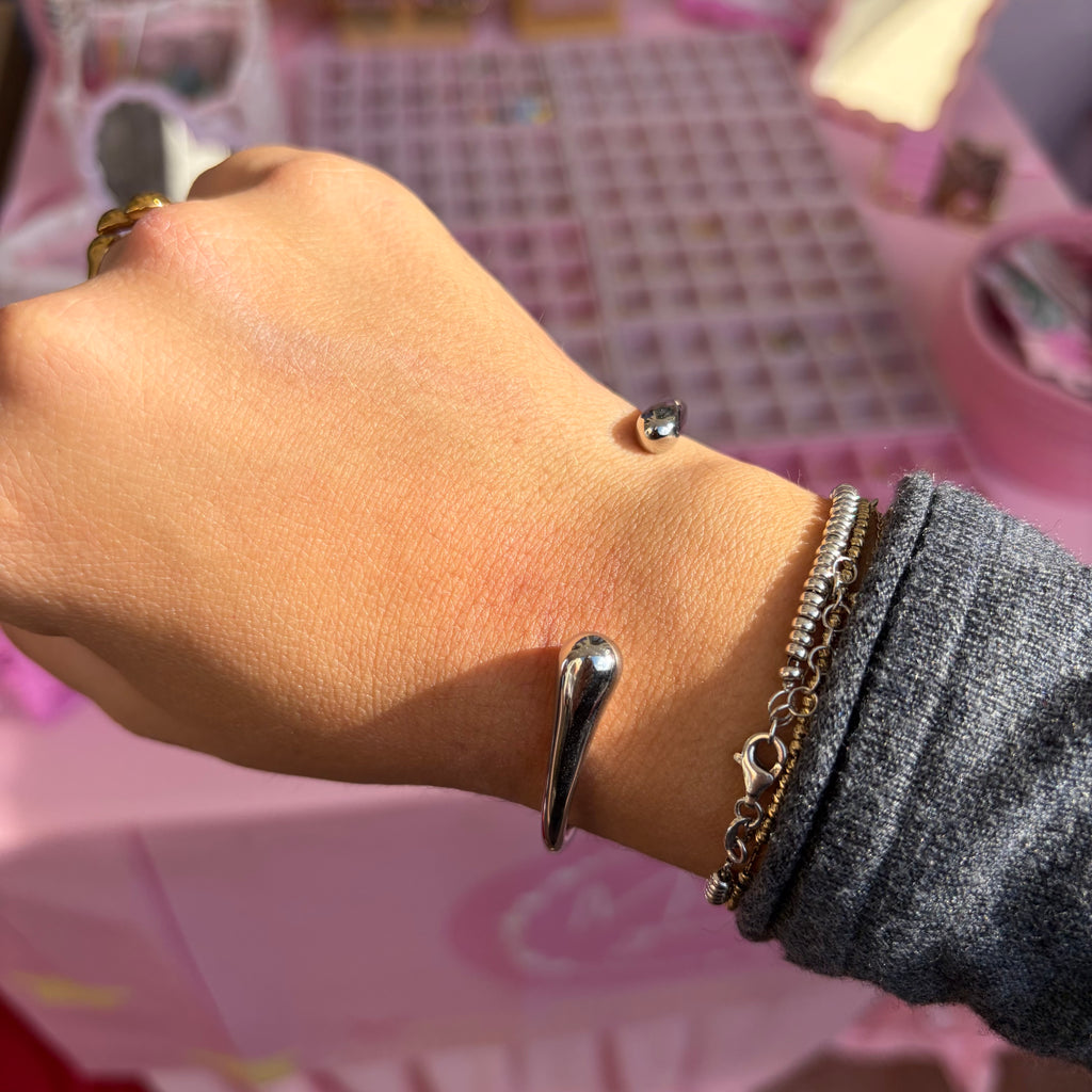 Bracciale rigido abbraccio in 2 colori