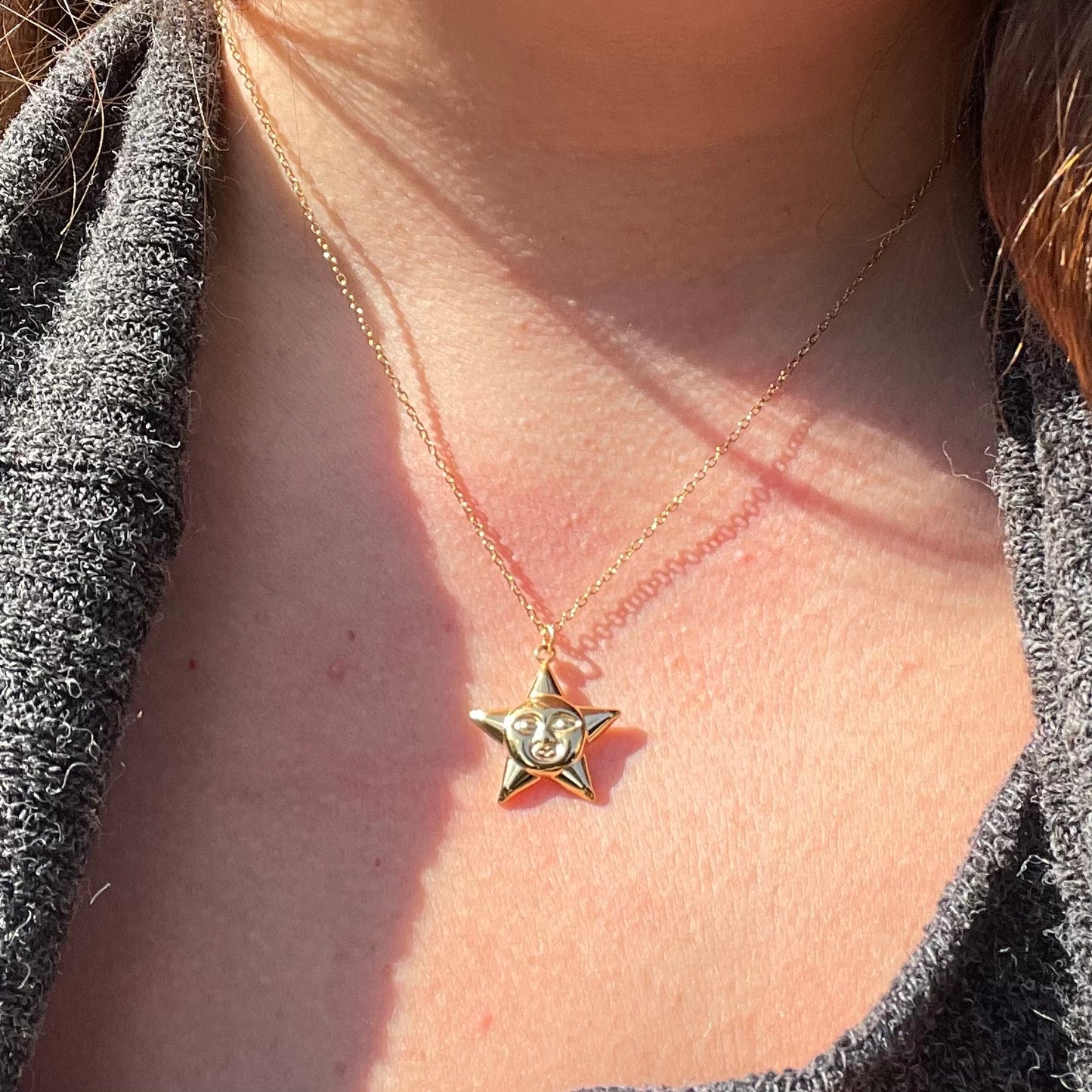 Collana stella con viso in 2 colori