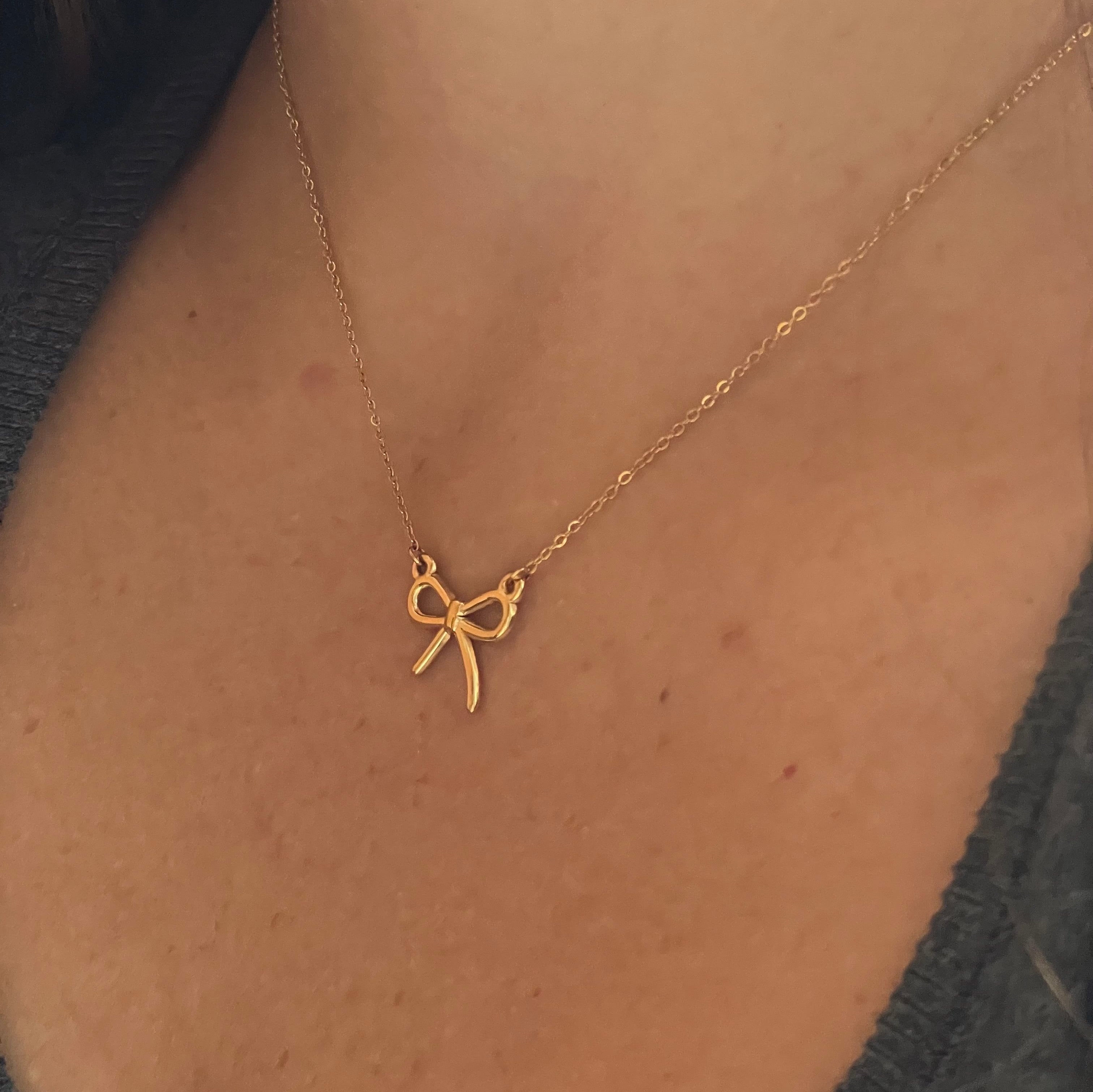 Collana fiocco luminoso in 2 colori