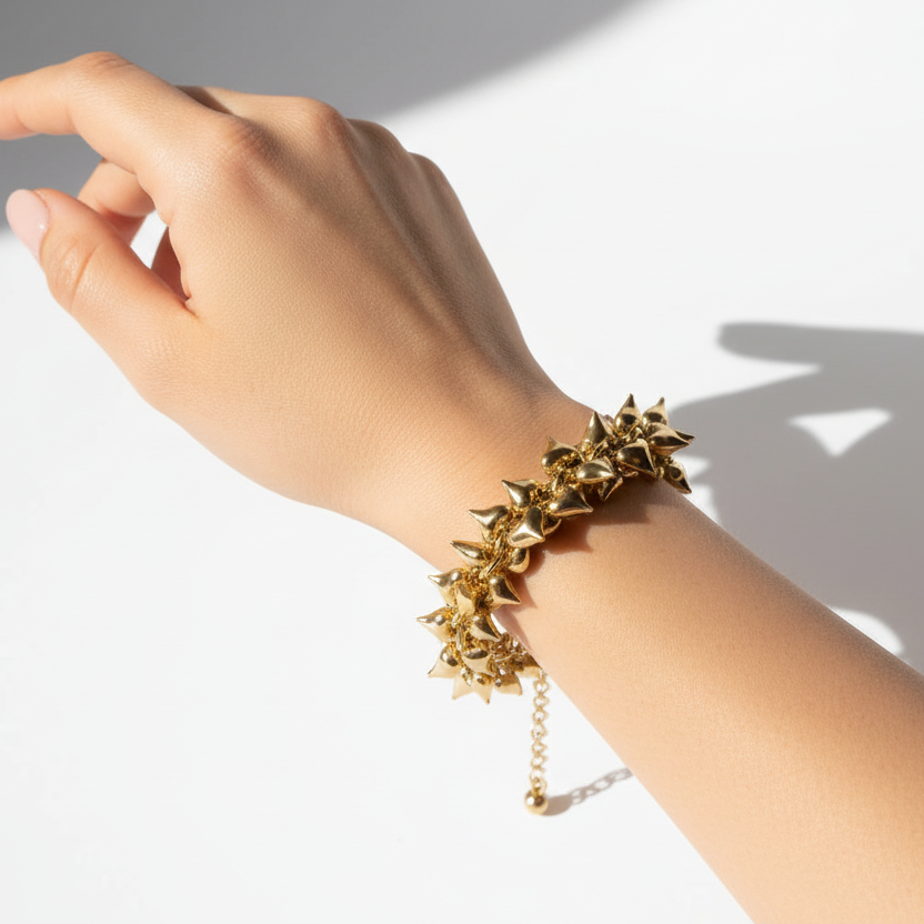 Bracciale cuori sonagli pendenti in 2 colori