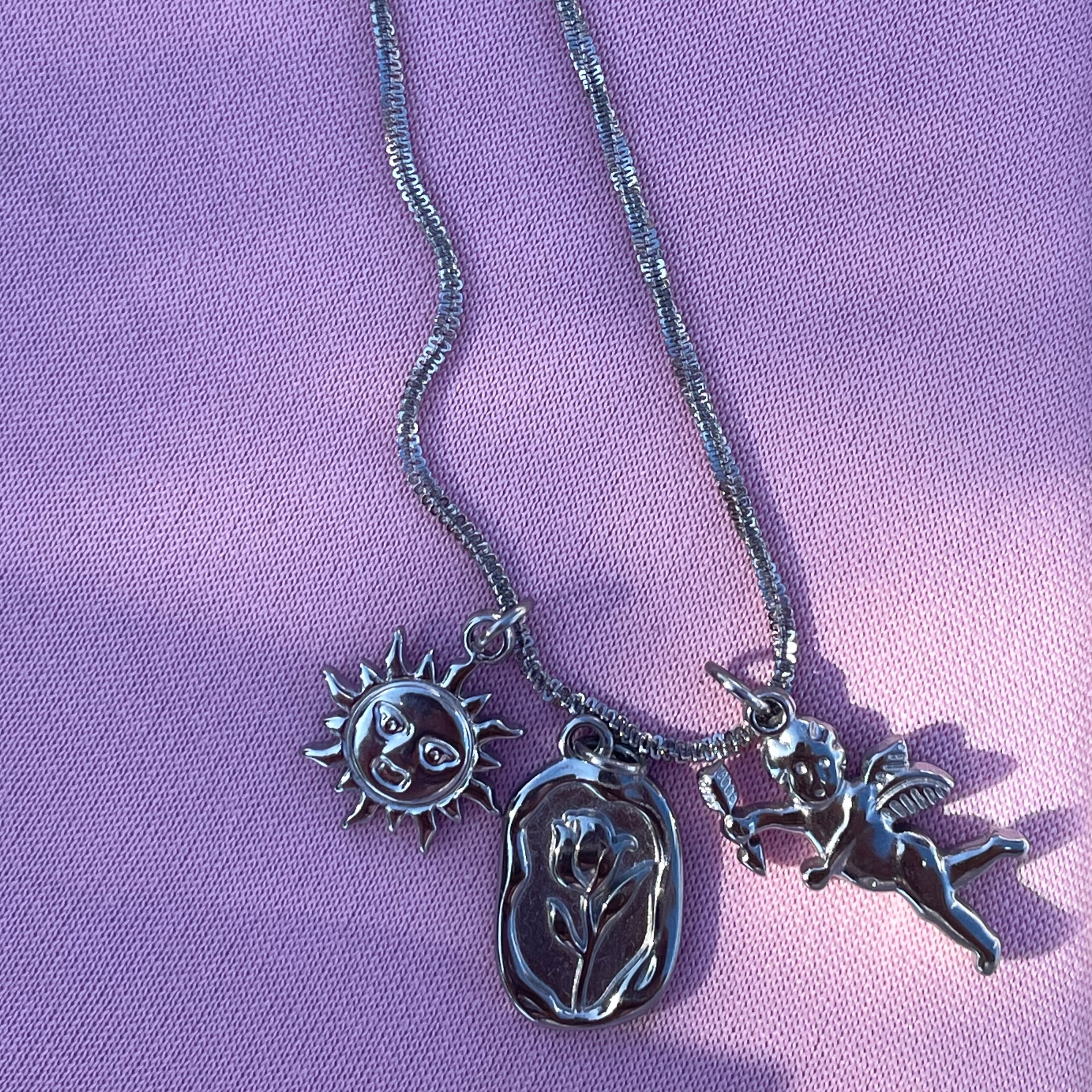 Charm Cupido in 2 colori
