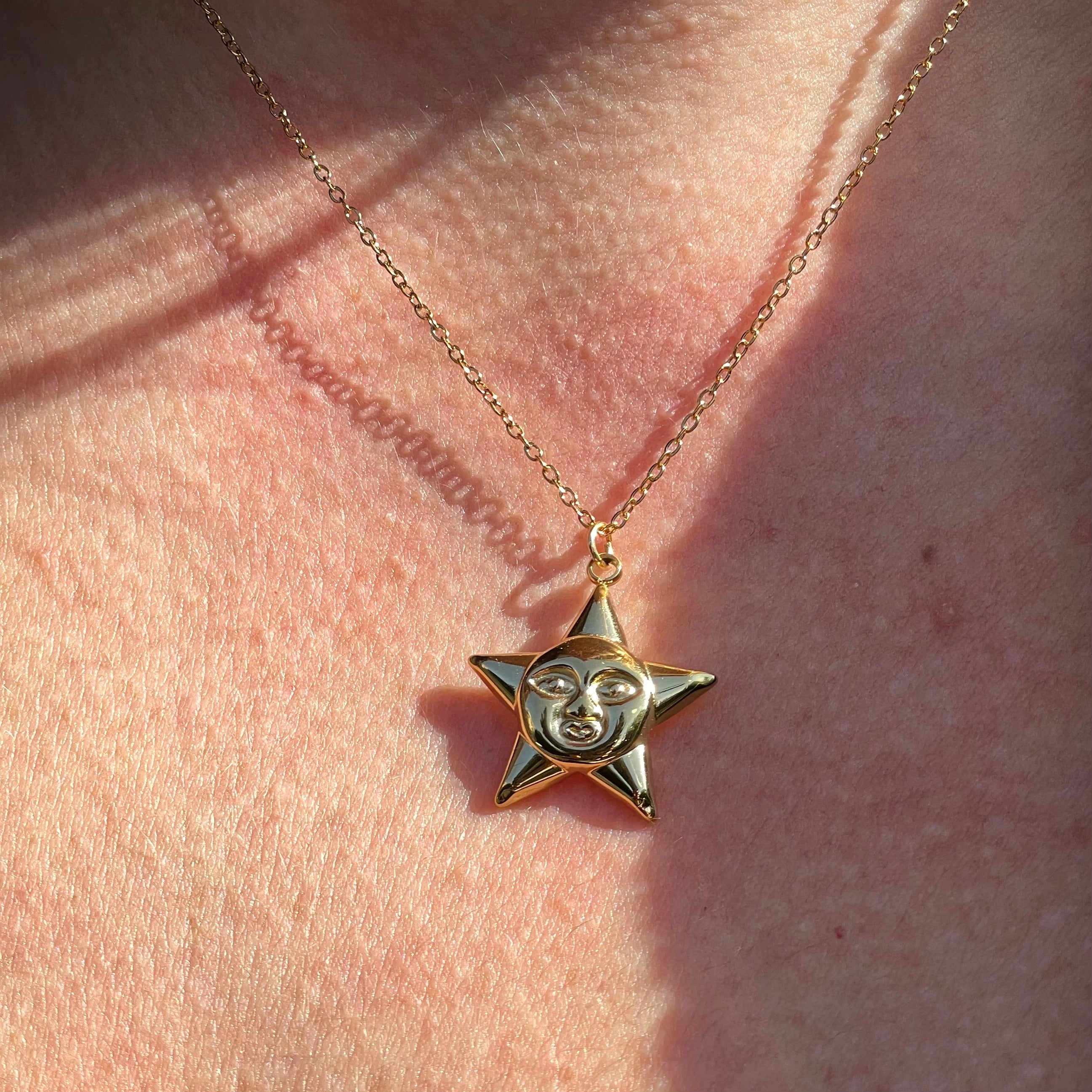 Collana stella con viso in 2 colori