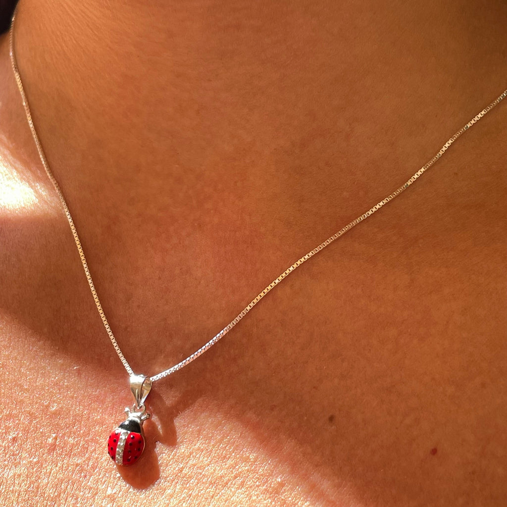 Collana coccinella smaltata in 4 fantasie