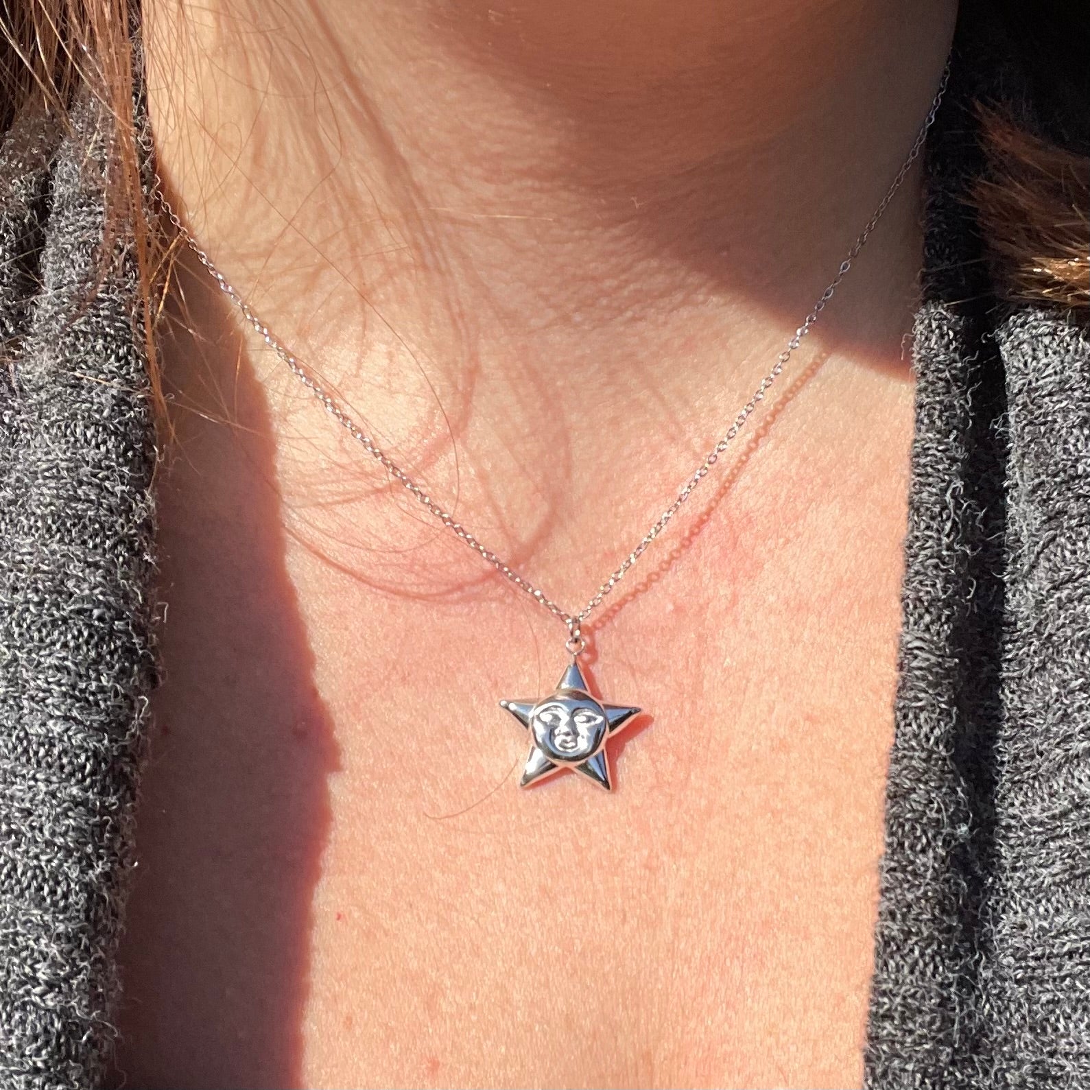 Collana stella con viso in 2 colori
