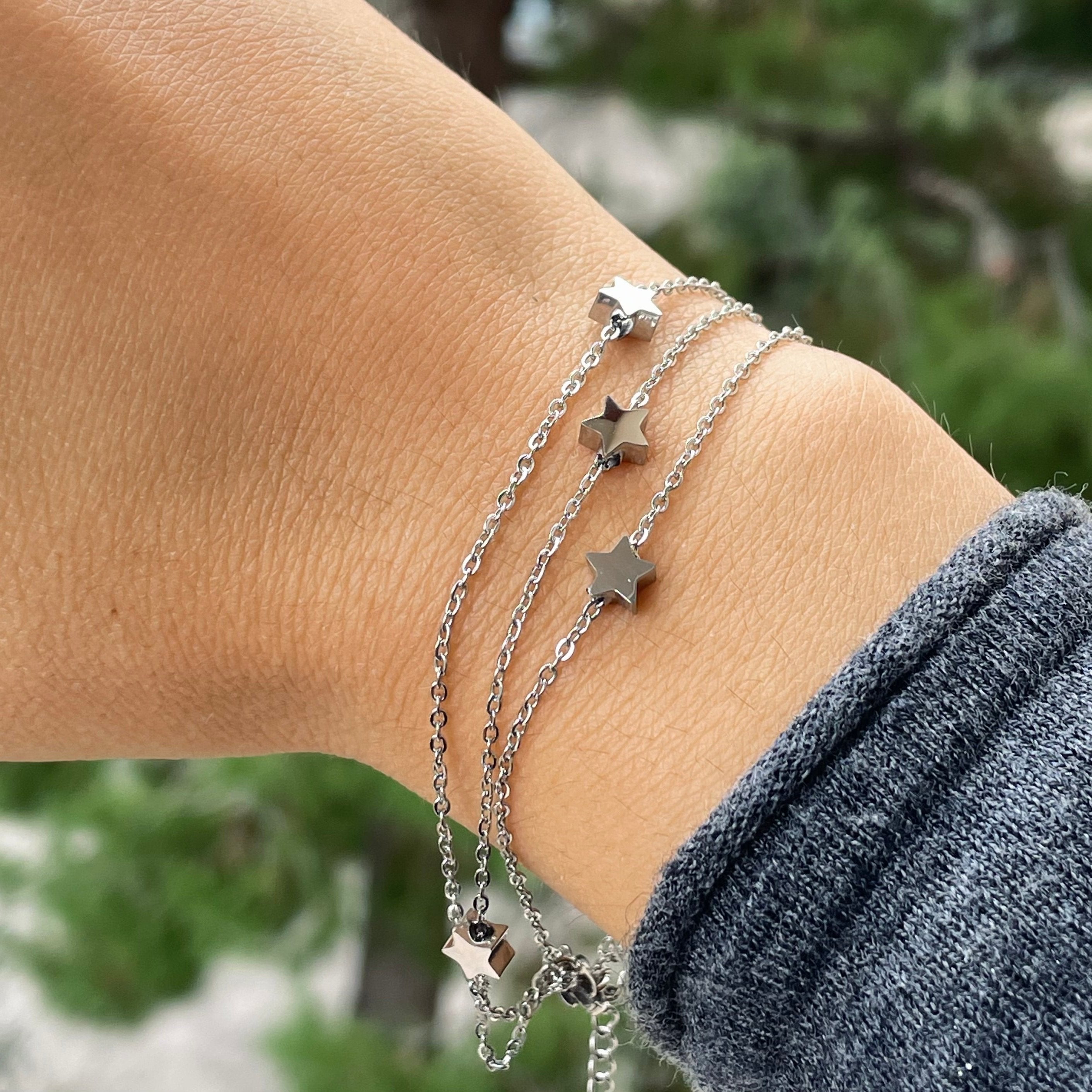 Bracciale stelline a tre fili in 2 colori