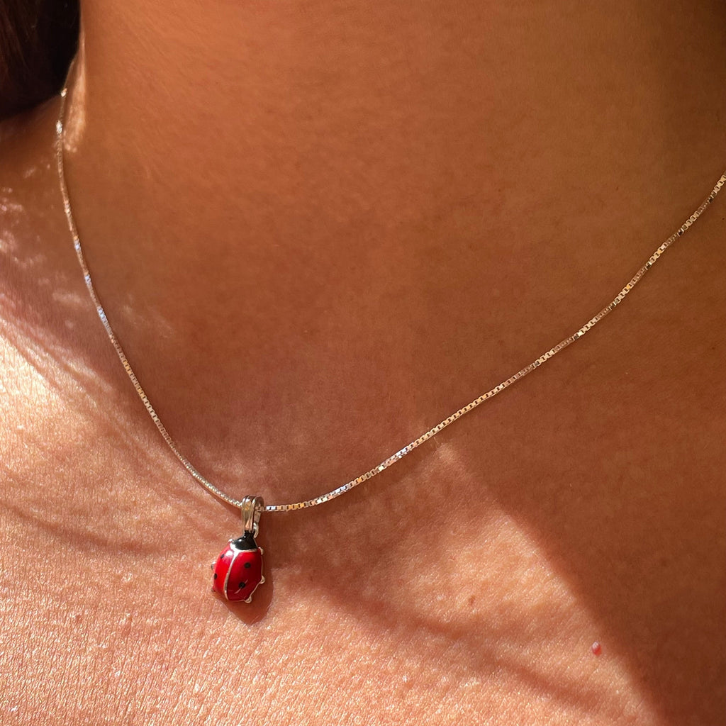 Collana coccinella smaltata in 4 fantasie
