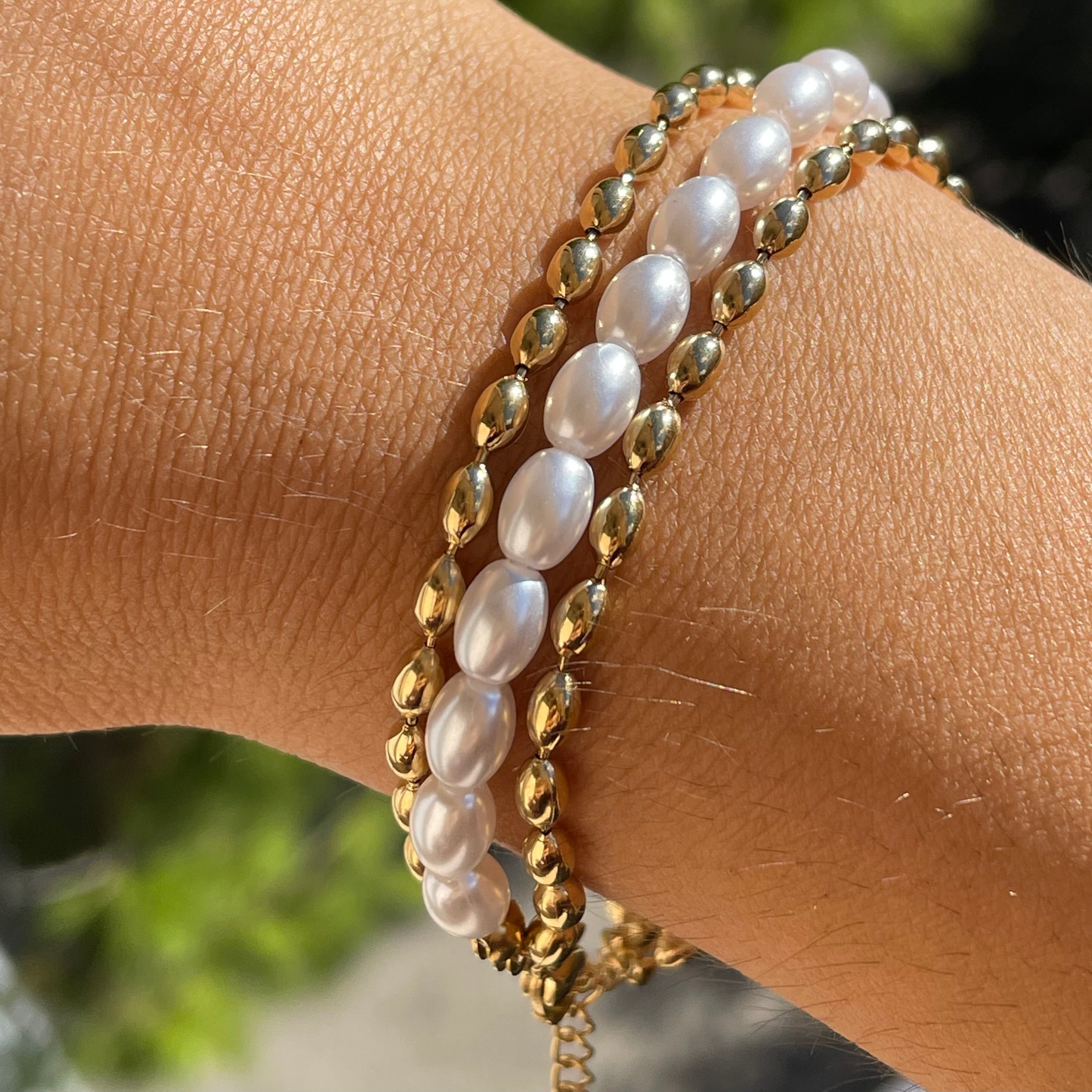 Bracciale di perle ovali in 2 colori
