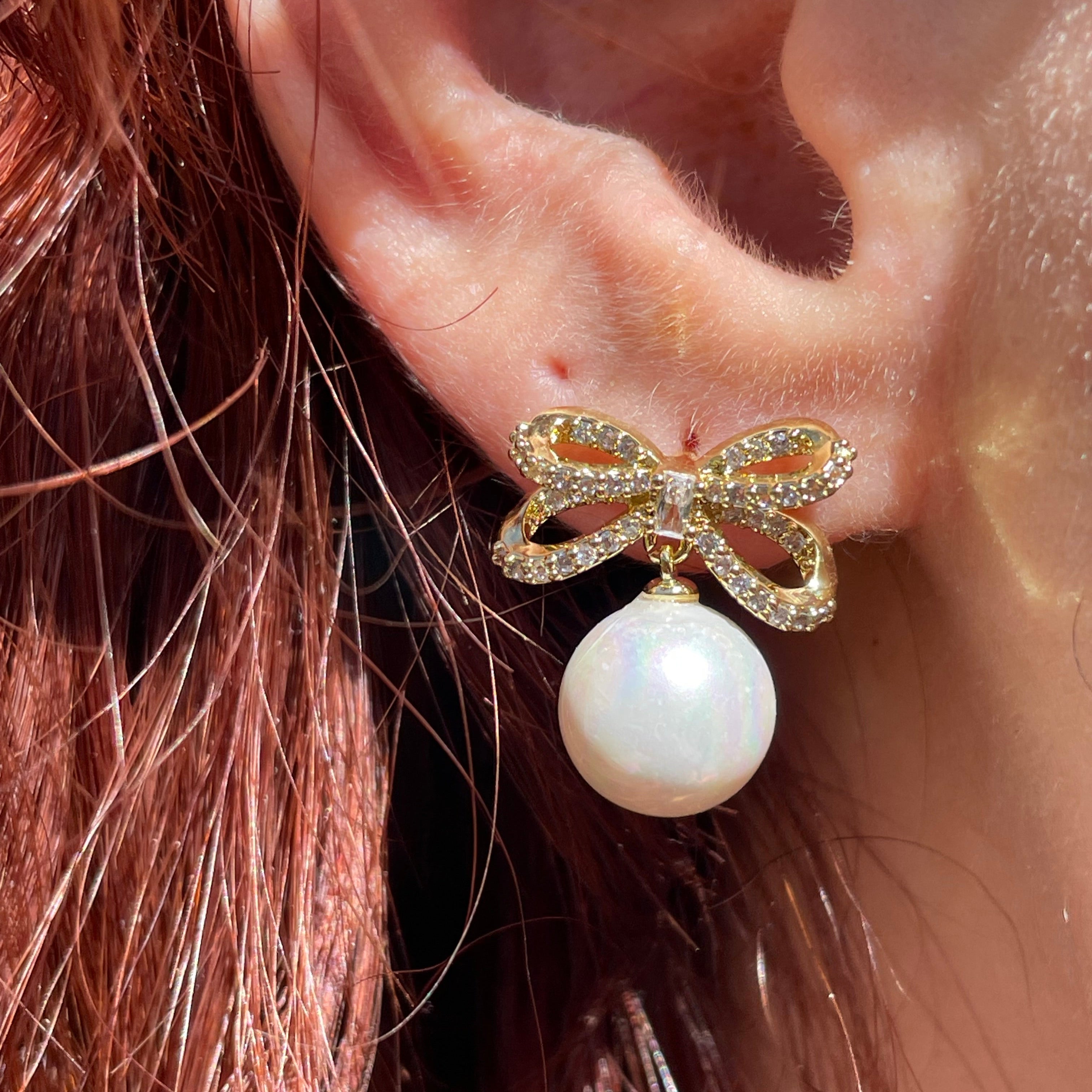 Orecchini fiocco di perla in 2 colori