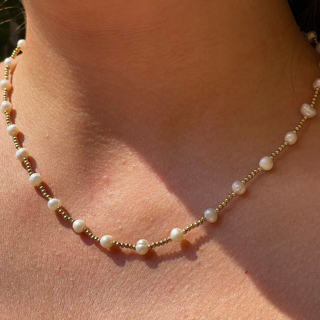 Collana con perle luminose
