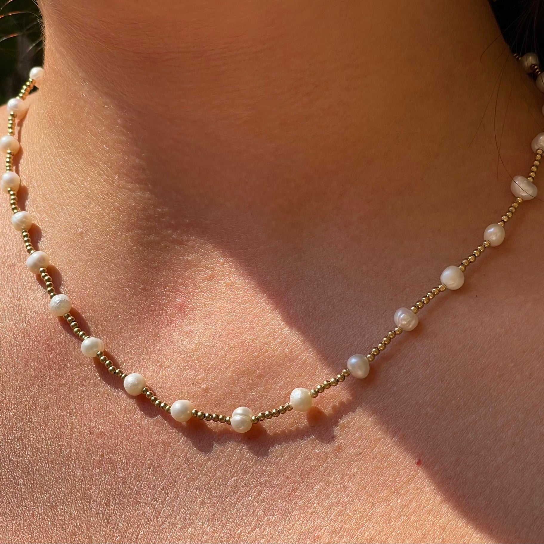 Collana con perle luminose