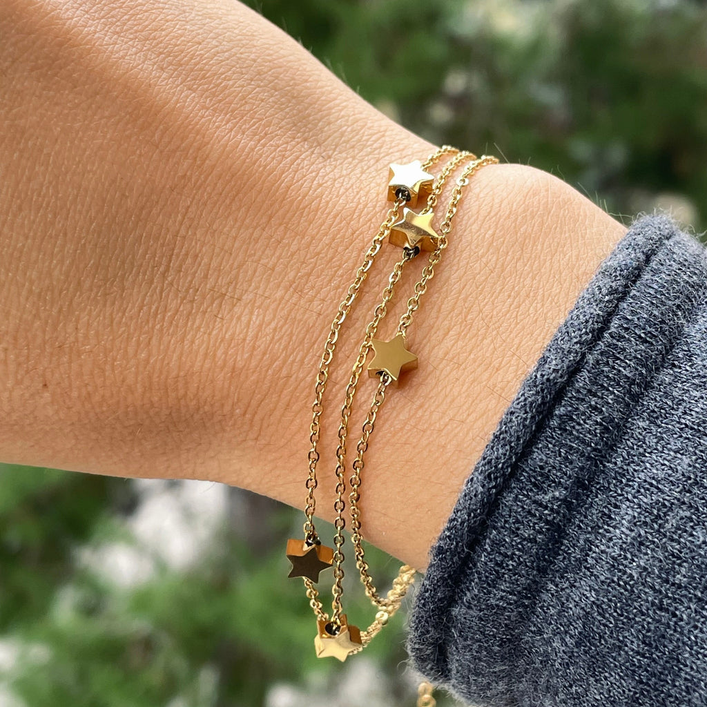 Bracciale stelline a tre fili in 2 colori