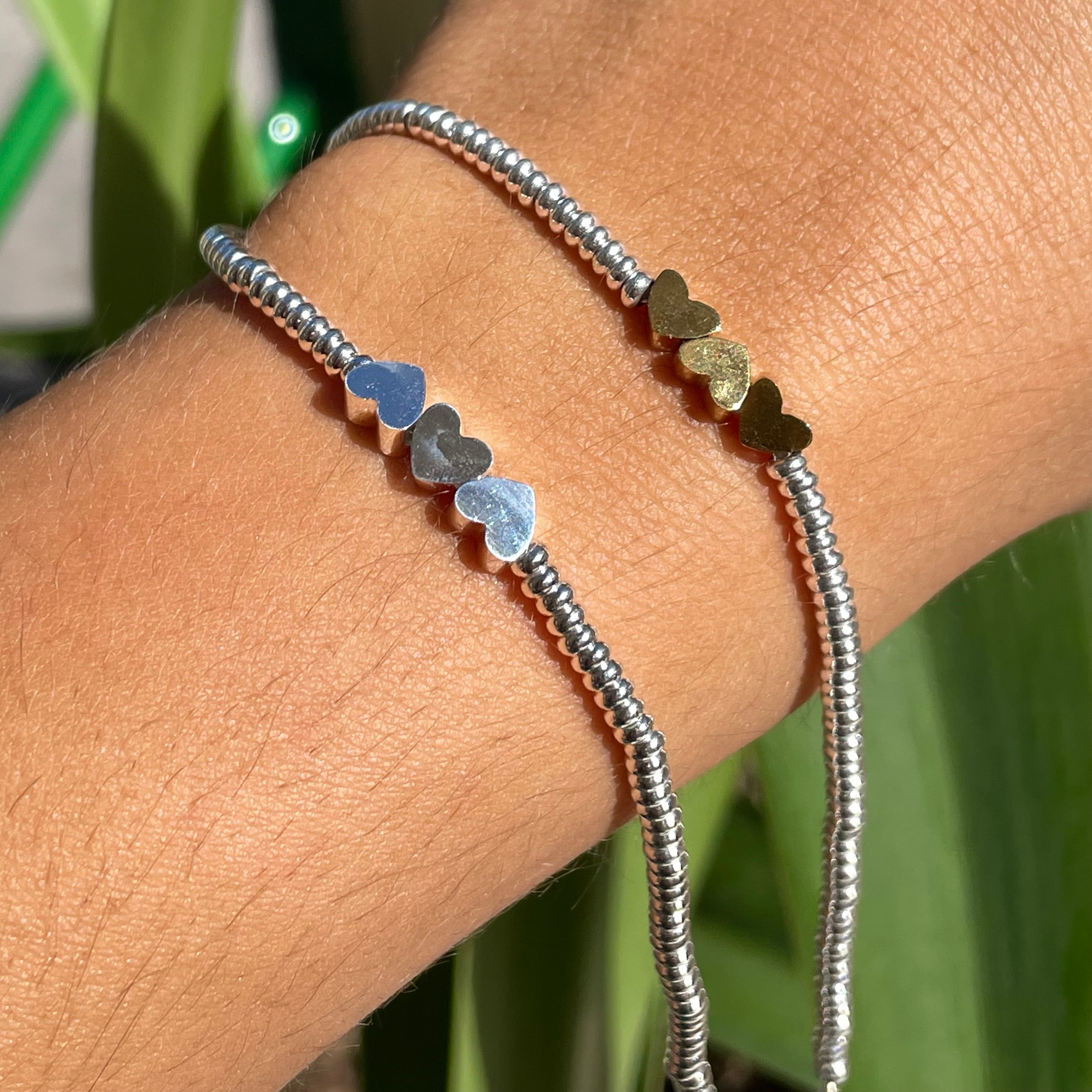 Bracciale tre cuori in 2 colori