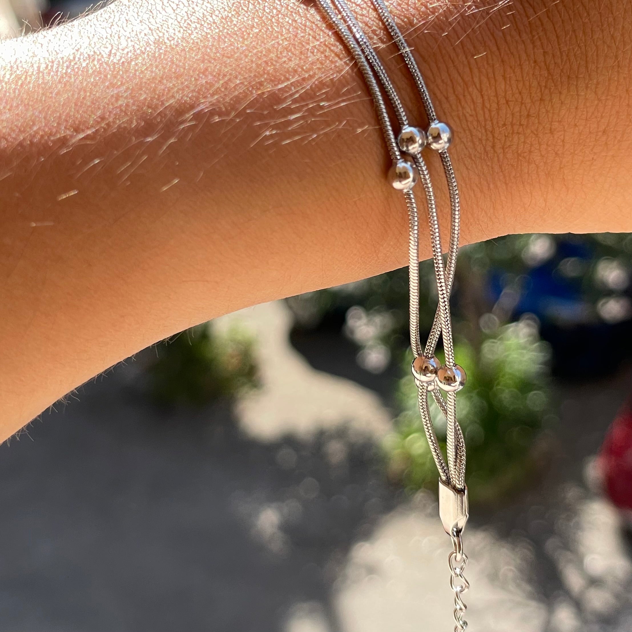 Bracciale pallini a tre in 2 colori