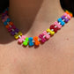 Collana con fiocchi colorati e perline