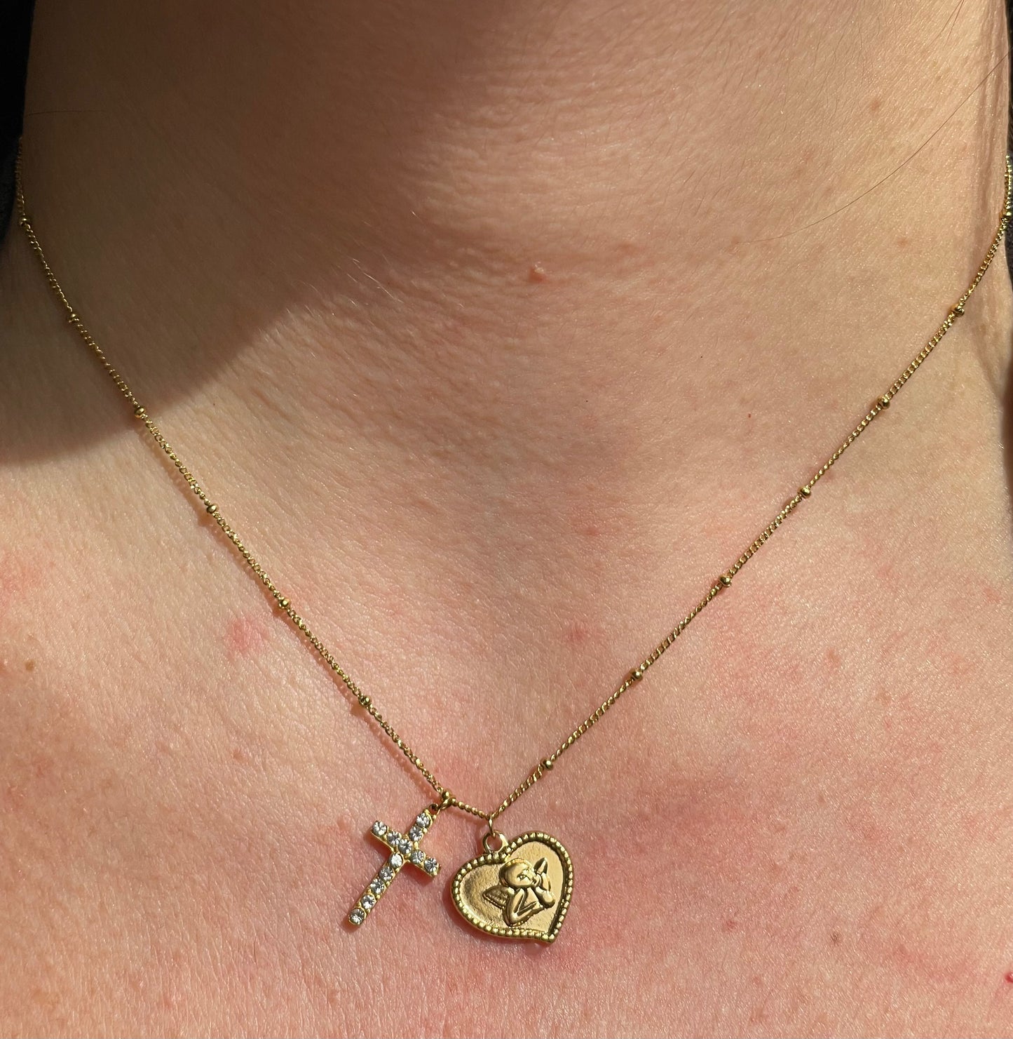 Collana con angelo e croce in 2 colori