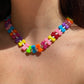 Collana con fiocchi colorati e perline