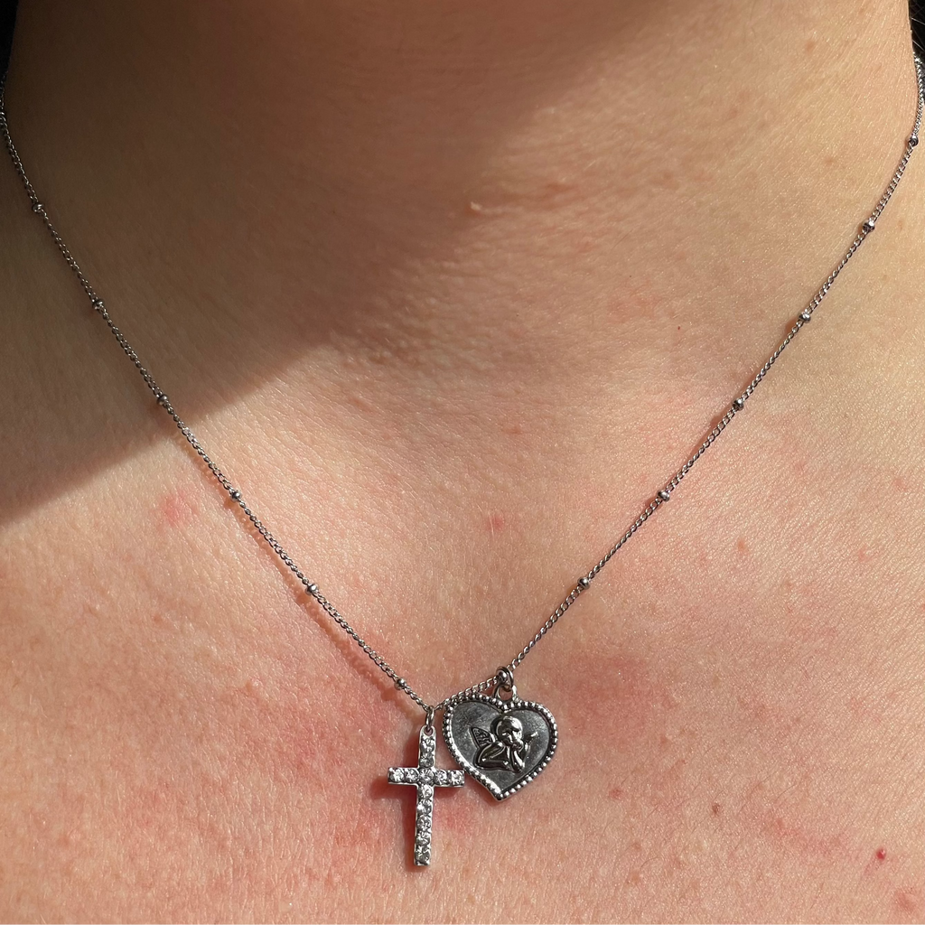 Collana con angelo e croce in 2 colori