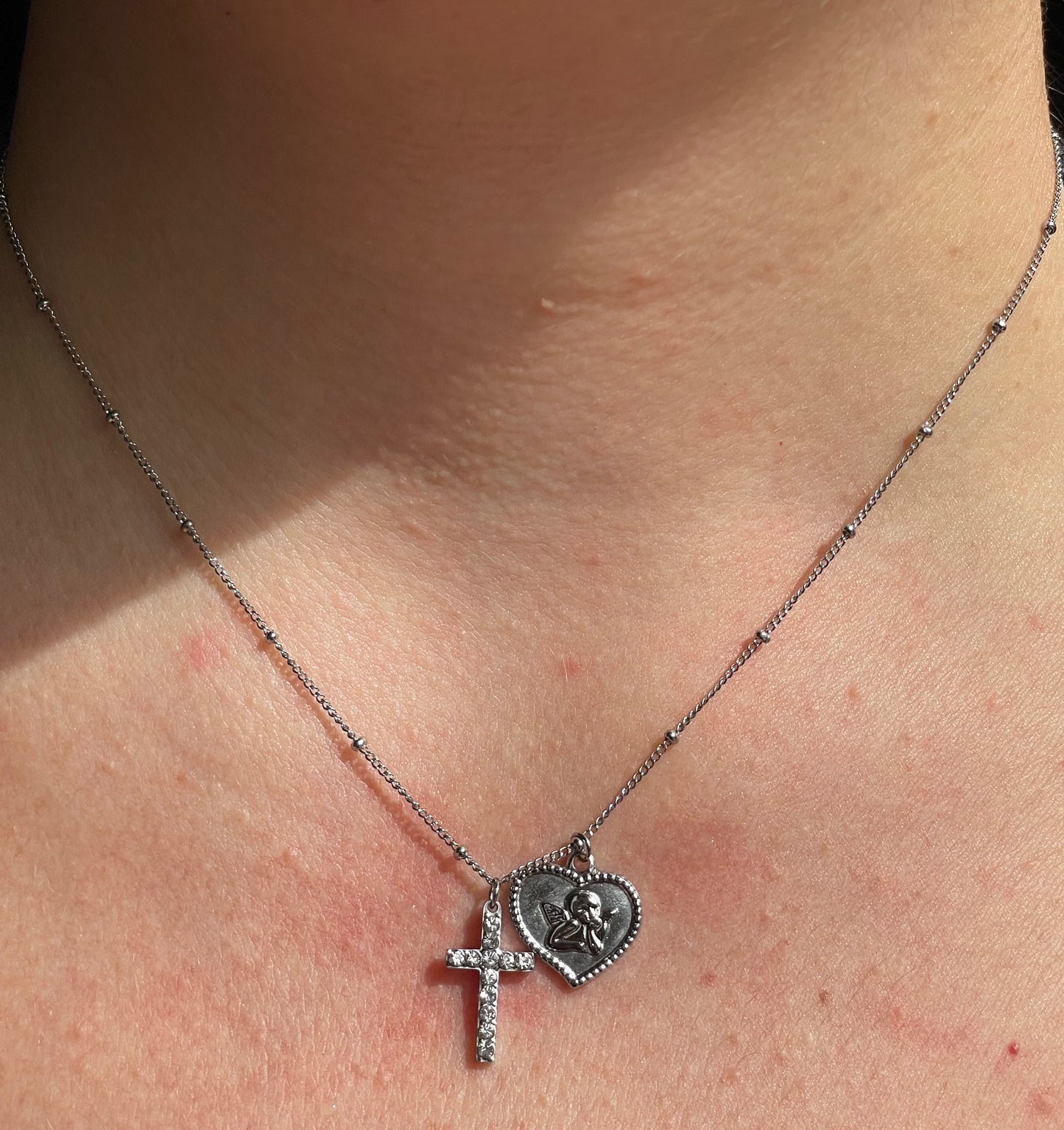 Collana con angelo e croce in 2 colori