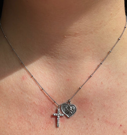 Collana con angelo e croce in 2 colori