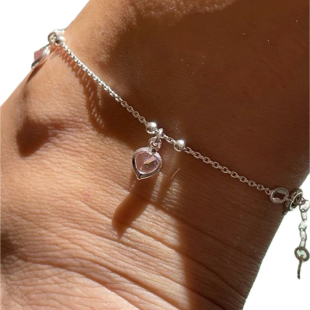 Cavigliera con cuori pendenti in 3 colori