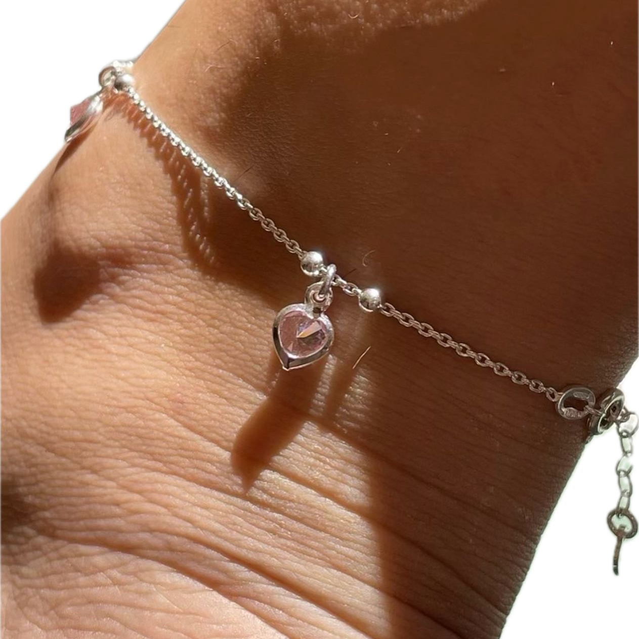 Cavigliera con cuori pendenti in 3 colori