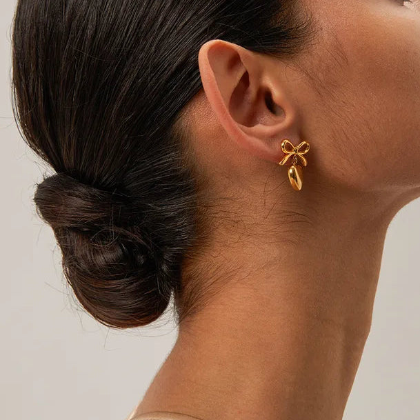 Orecchini fiocco e cuore 2 colori