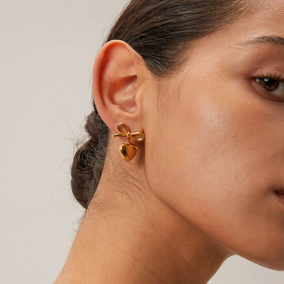 Orecchini fiocco e cuore 2 colori