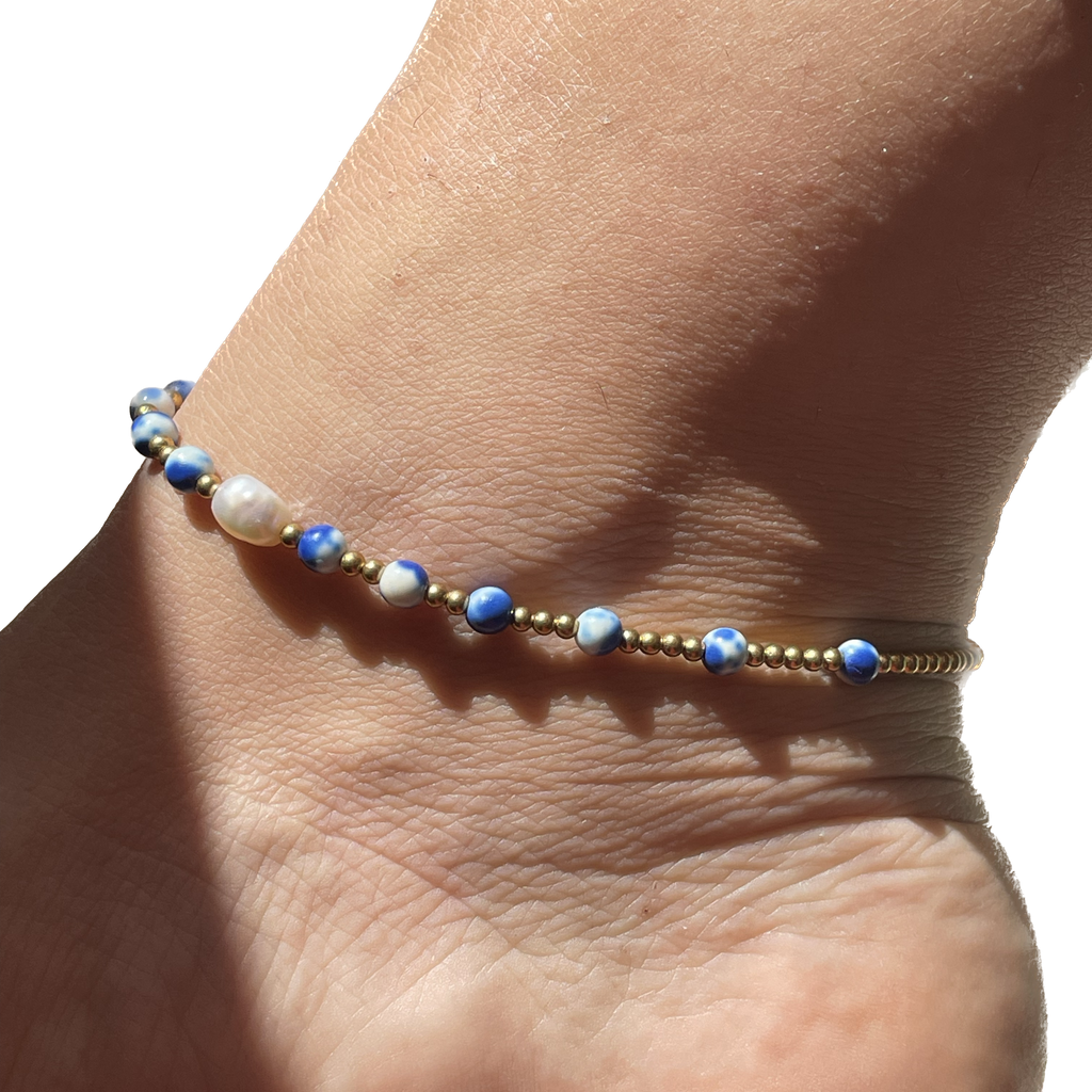 Cavigliera in 7 colori con perla di fiume