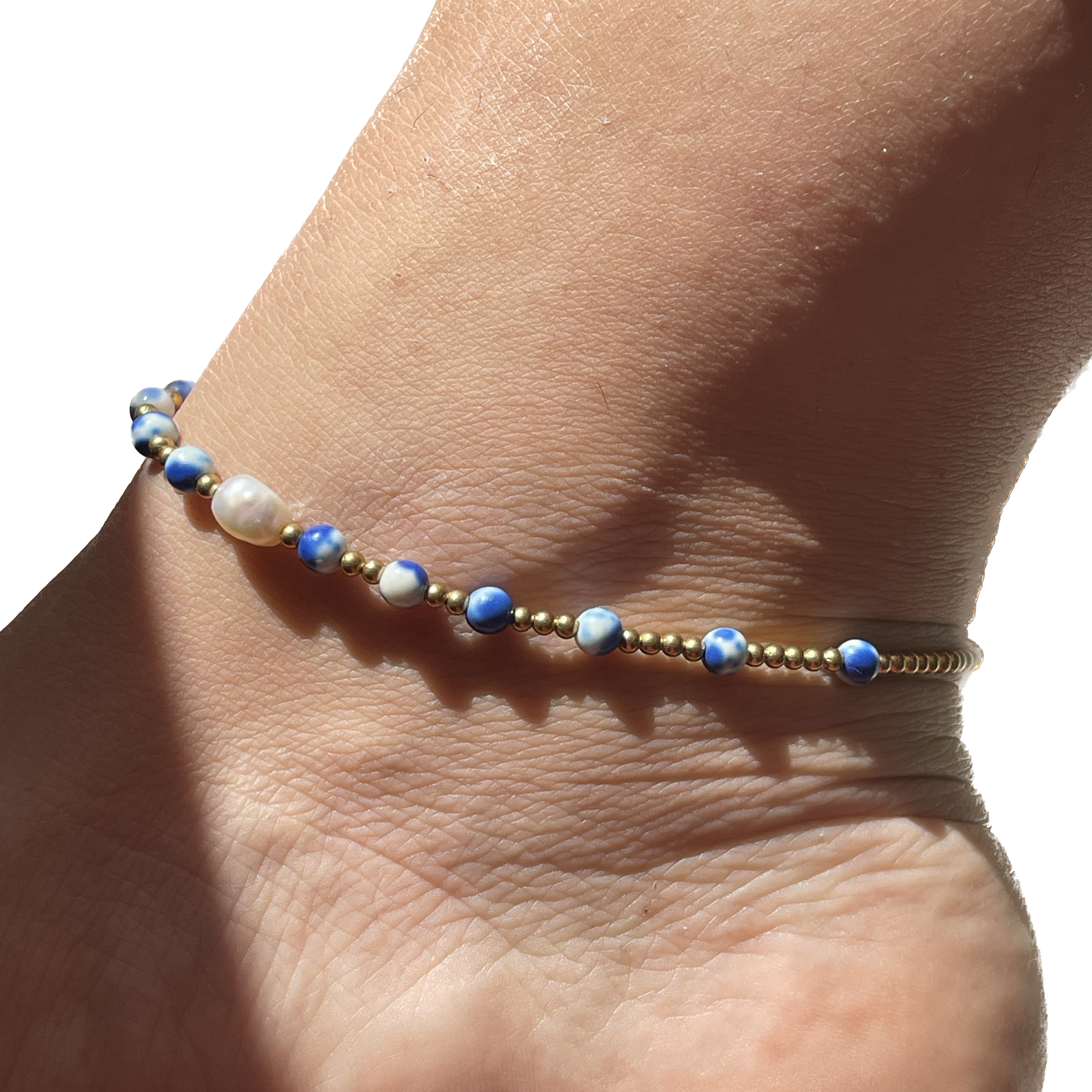 Cavigliera in 7 colori con perla di fiume