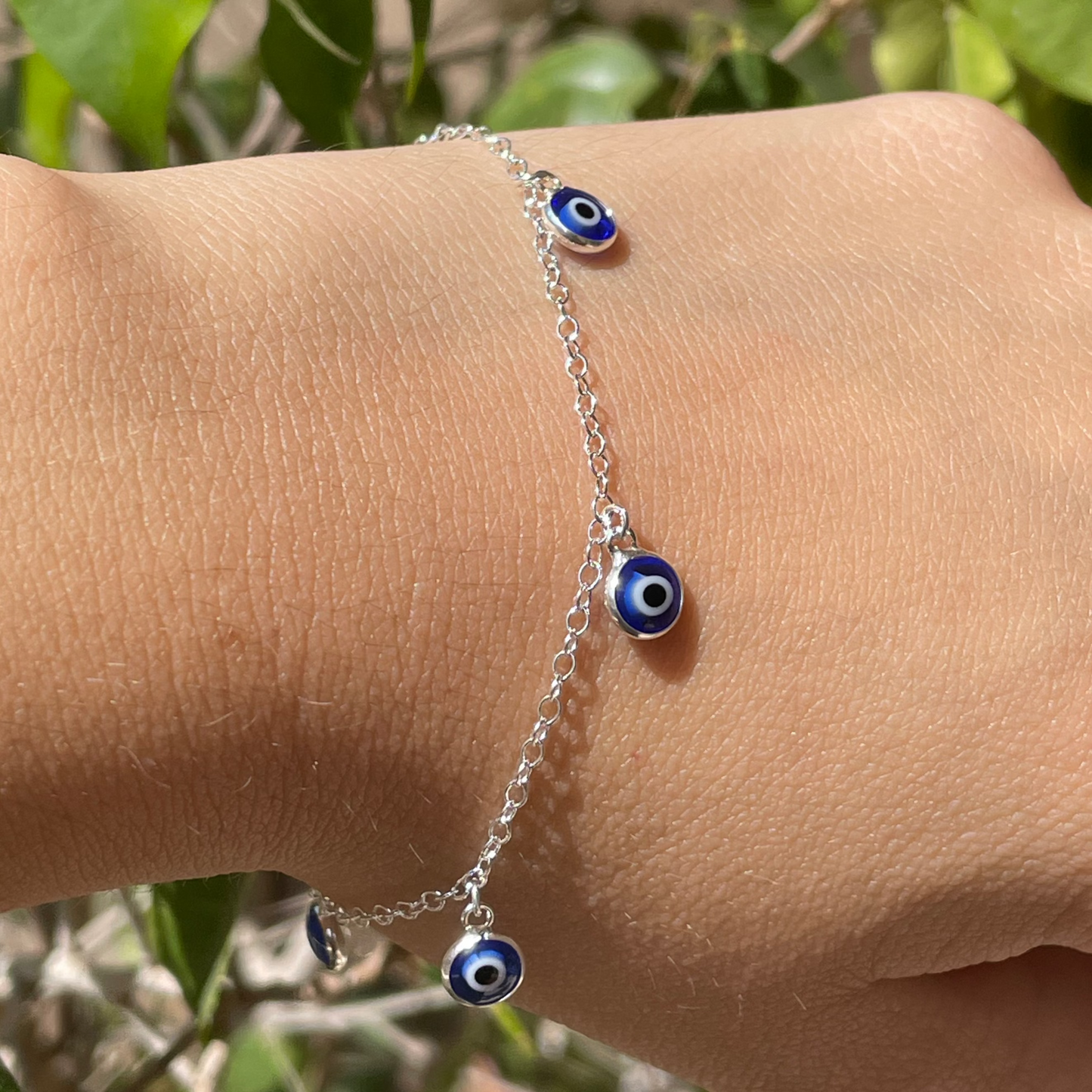 Set collana, bracciale e orecchini con occhio di Allah blu
