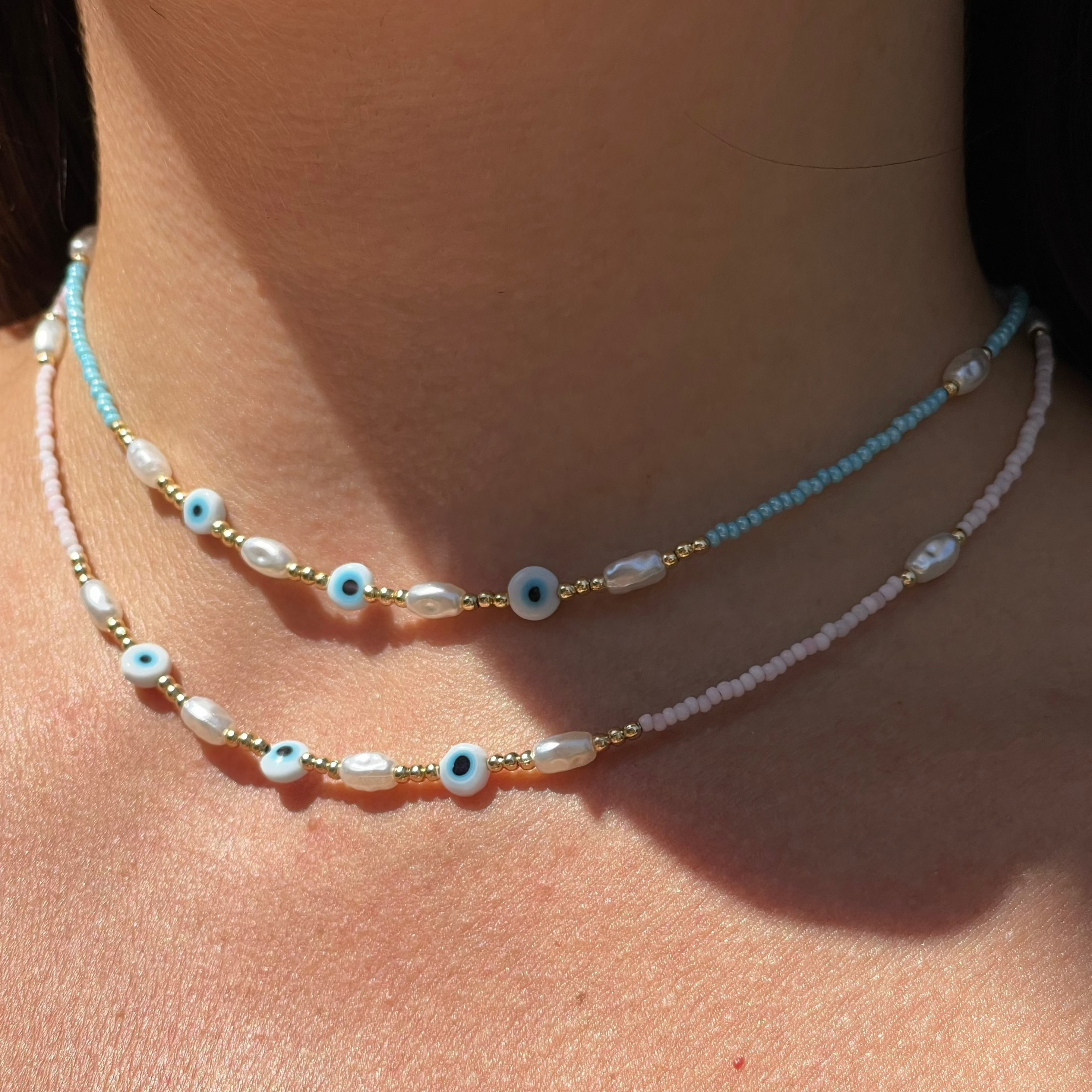 Collana con perline e occhio di Allah in 2 colori