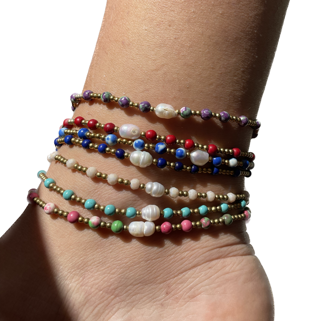 Cavigliera in 7 colori con perla di fiume