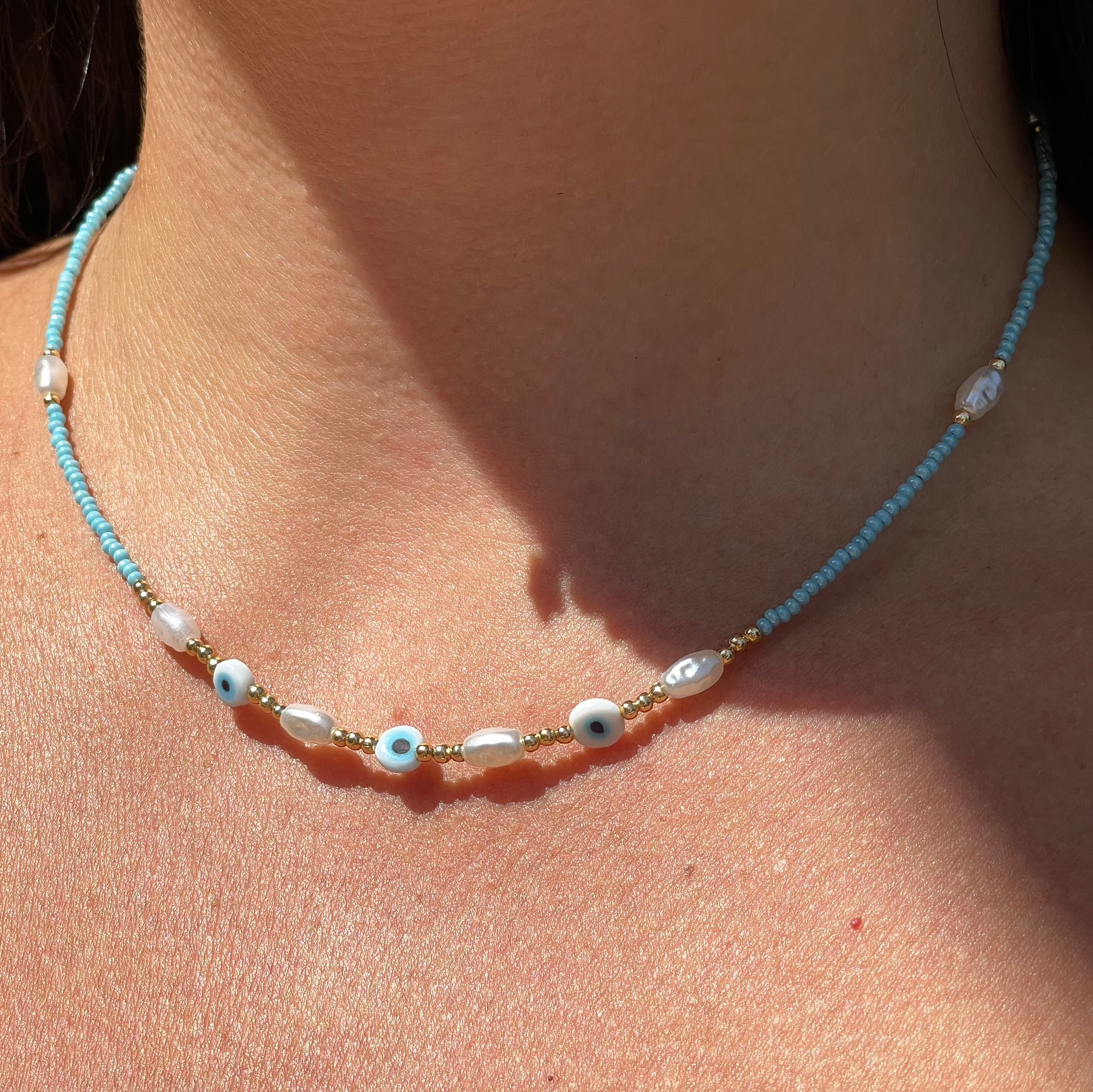 Collana con perline e occhio di Allah in 2 colori
