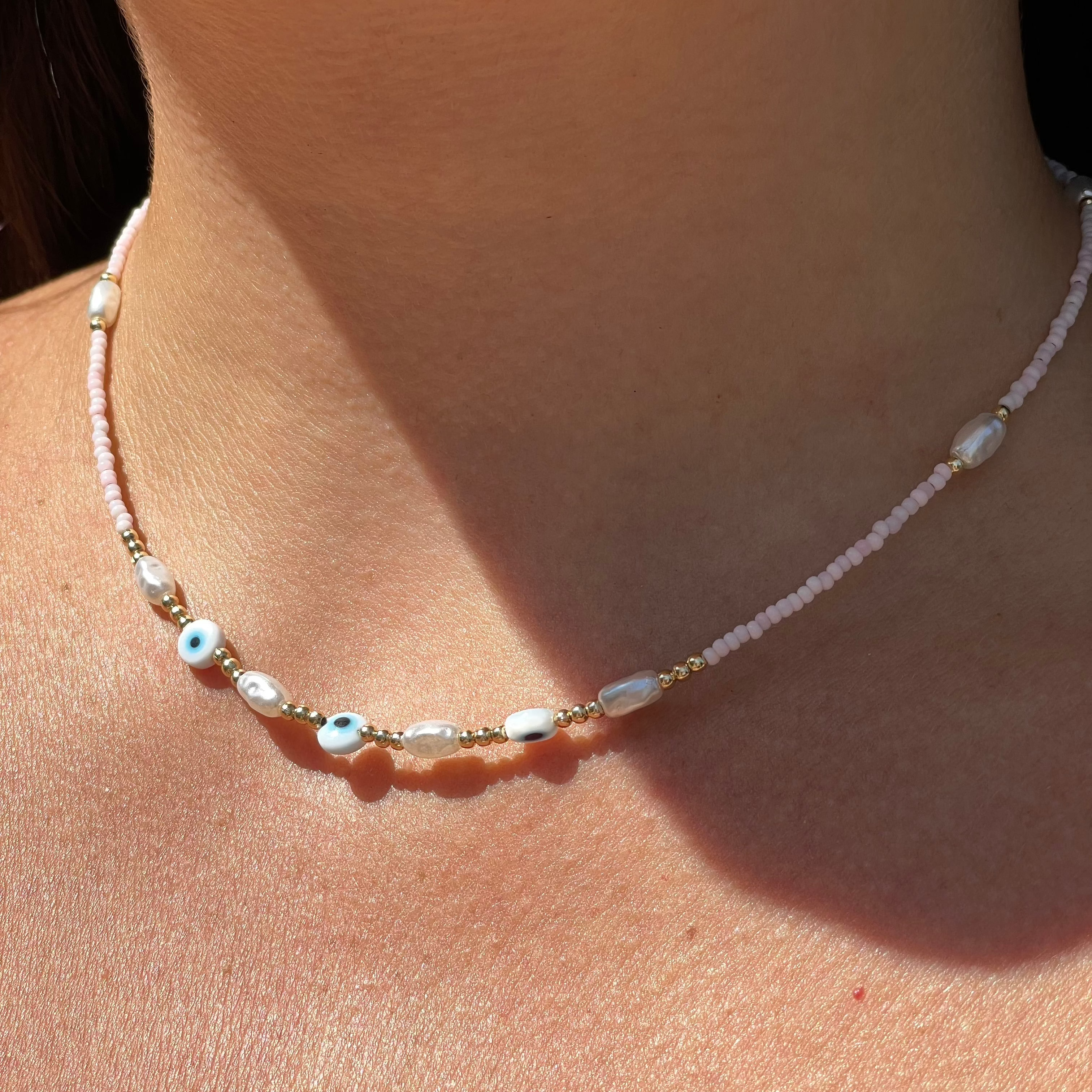 Collana con perline e occhio di Allah in 2 colori