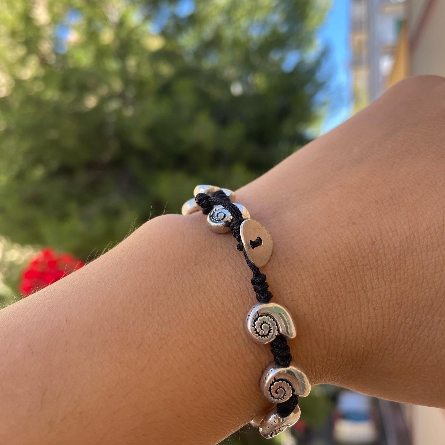 Bracciale con charm in 5 fantasie