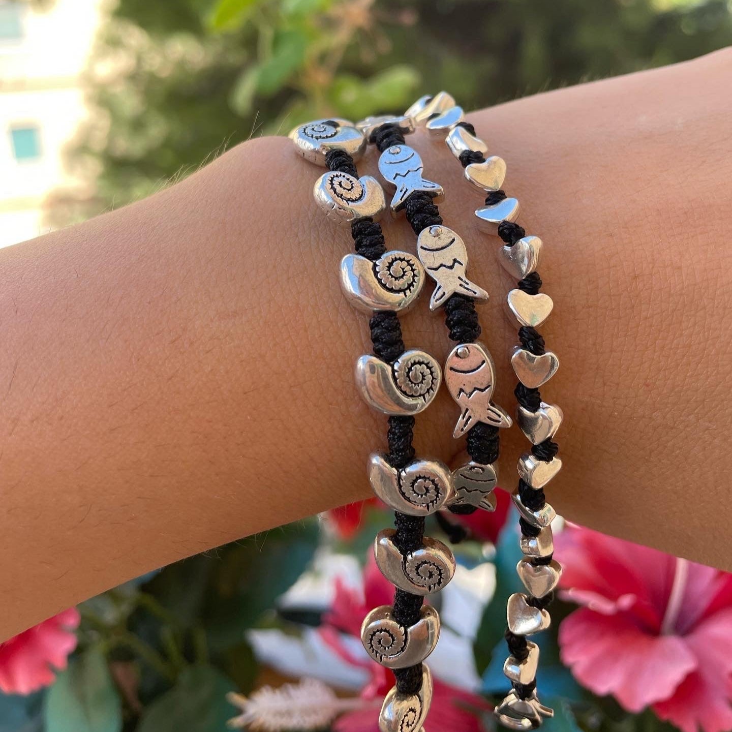 Bracciale con charm in 5 fantasie