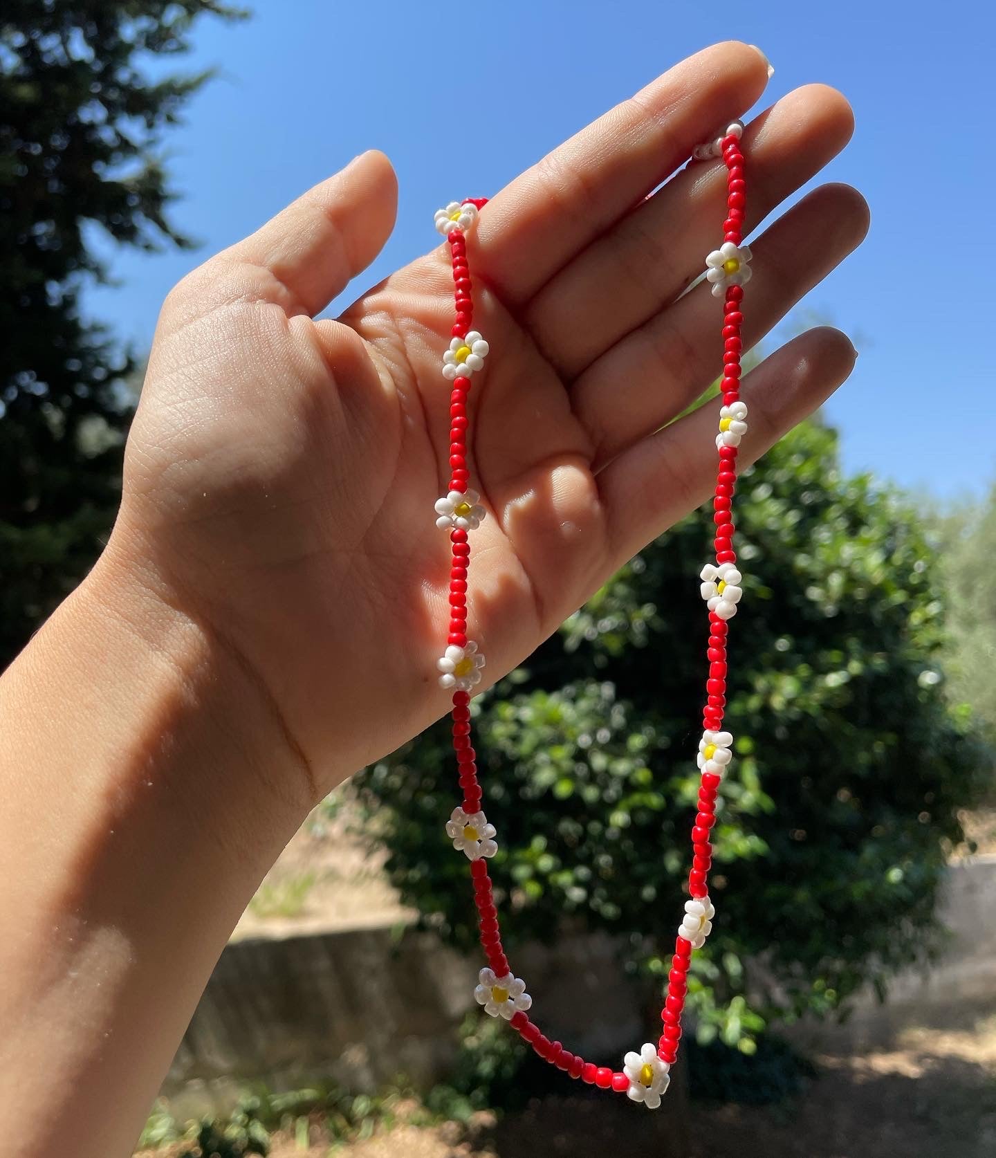 Collana con perline e fiori in 7 colori