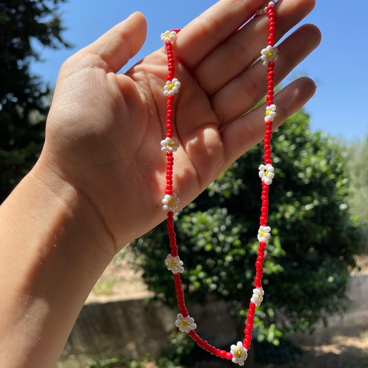 Collana con perline e fiori in 7 colori
