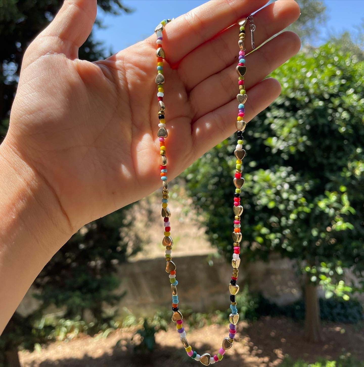 Collana con perline e cuori in 2 colori