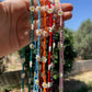 Collana con perline e fiori in 7 colori