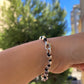 Bracciale con charm in 5 fantasie