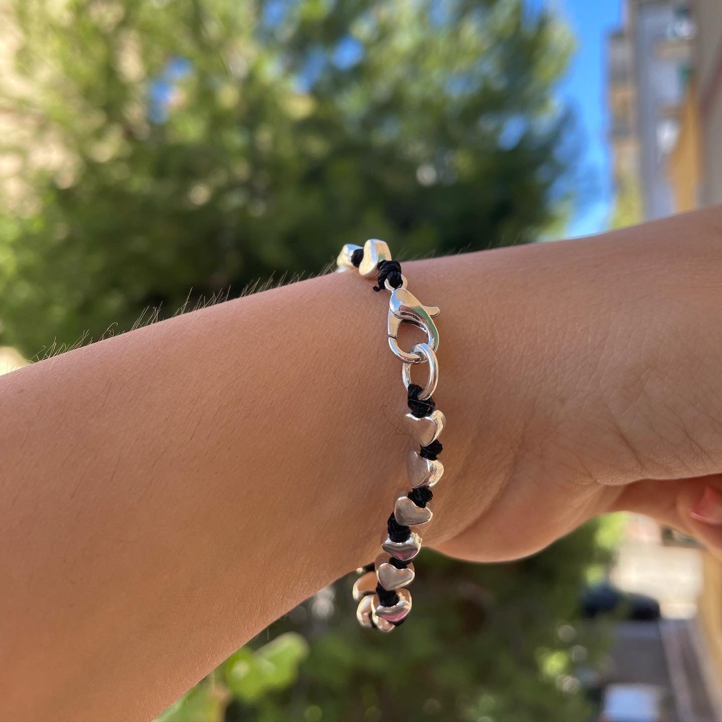 Bracciale con charm in 5 fantasie