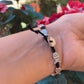 Bracciale con charm in 5 fantasie