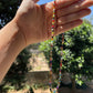 Collana con perline e stelle in 2 colori
