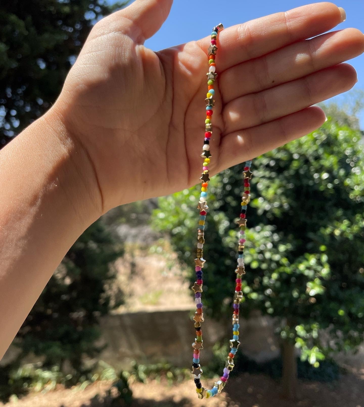 Collana con perline e stelle in 2 colori