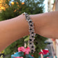 Bracciale con charm in 5 fantasie