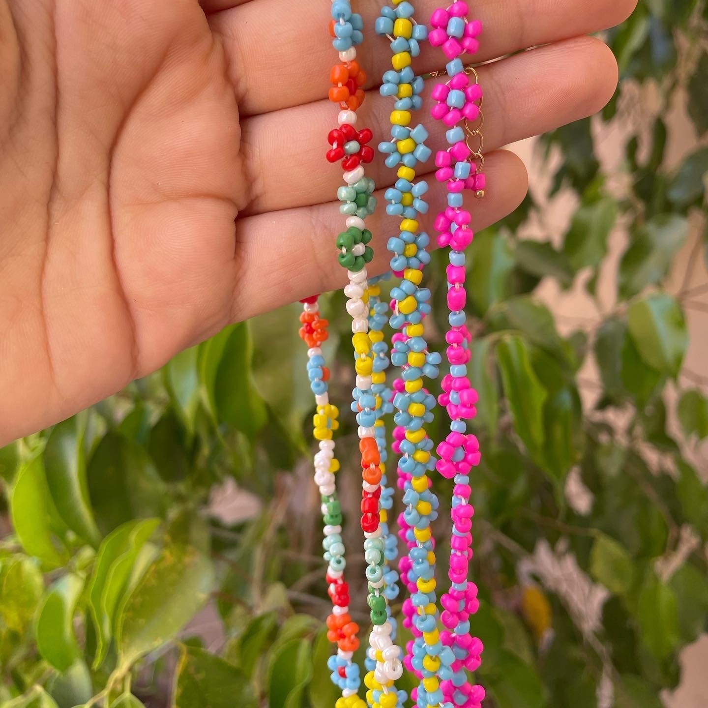Collana con fiori in 3 colori