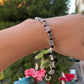 Bracciale con charm in 5 fantasie